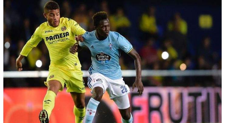Football: Lyon sign Pape Diop from Celta Vigo 