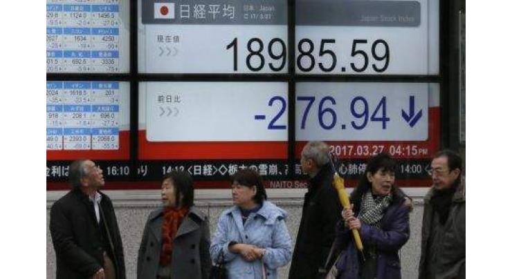 Tokyo stocks up at break despite N.Korea rocket launch 