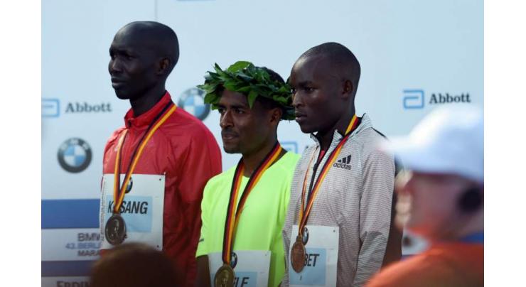 Athletics: Top trio threaten marathon record in Berlin 
