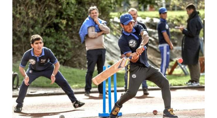 Refugees take northern French town to cricket glory 