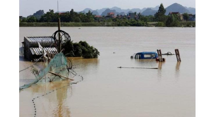 Vietnam braces for more downpours as flood toll hits 72 
