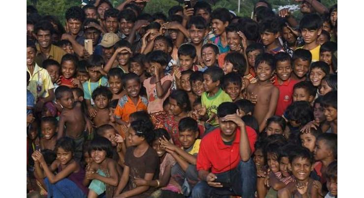 Clowns bring laughter to traumatised Rohingya children 