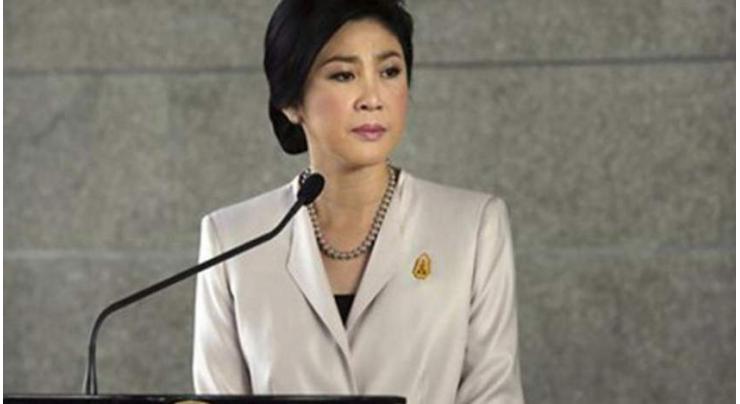 Thailand revokes passports of exiled former PM Yingluck 