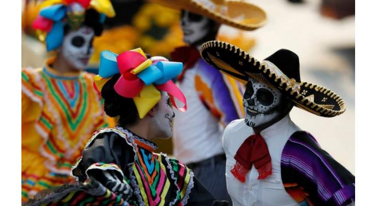 Mexico celebrates Day of the Dead in year of earthquakes, violence 
