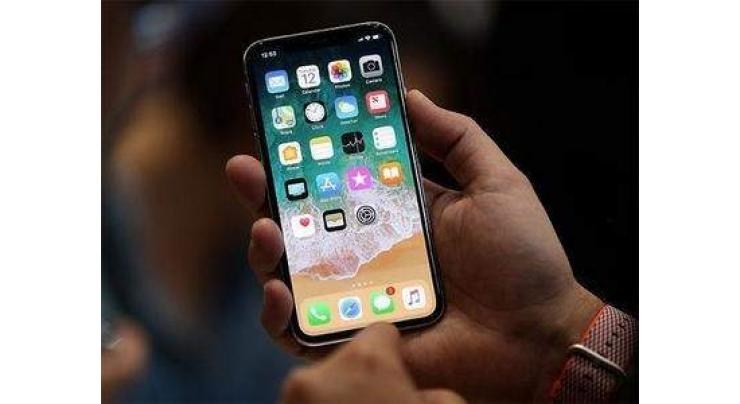 Apple's iPhone X hits Asia stores as profits soar 
