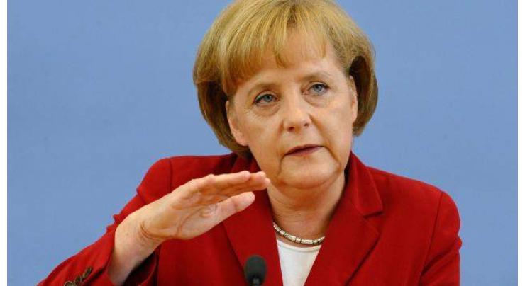 Merkel's fate in balance as German coalition talks drag on 