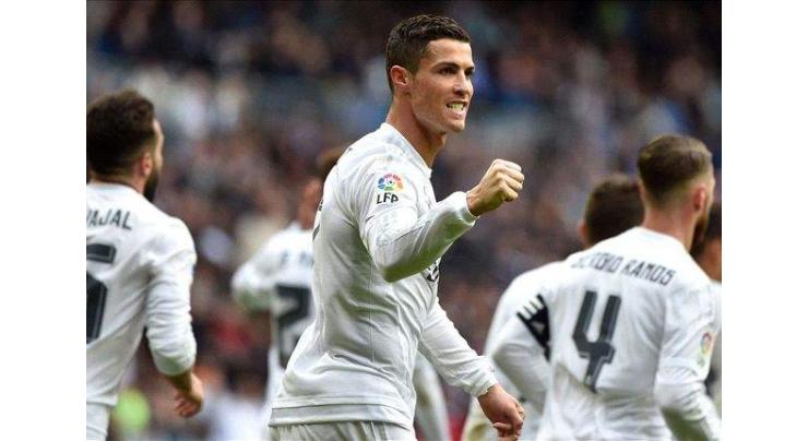Football: Ronaldo relieved as Madrid edge five-goal Malaga thriller 