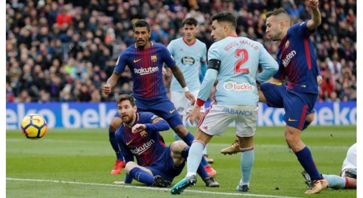 Football: Barca slip in Celta thriller offers Real, Atletico hope 