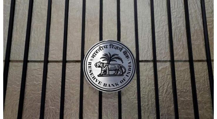 India's central bank holds rates at seven-year low 