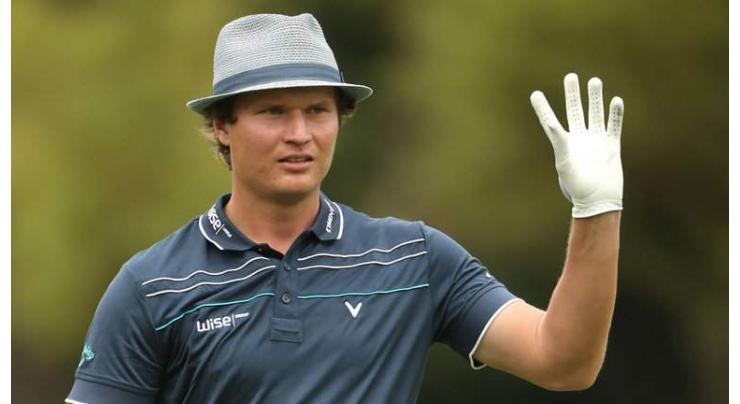 Golf: Hats off to Finn as birdie blitz gives him lead 