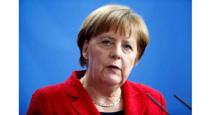 Germany's SPD agrees to exploratory govt talks with Merkel 