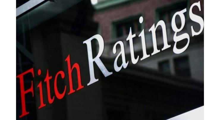 Fitch raises Irish debt rating, citing healthier banks 