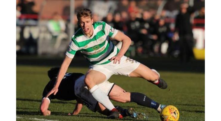 Football: Celtic down Dundee to go 11 points clear 