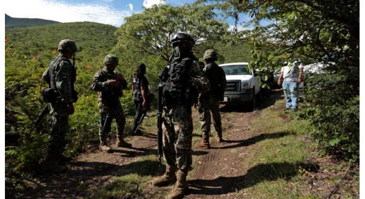 32 bodies found in mass graves in rural Mexico 