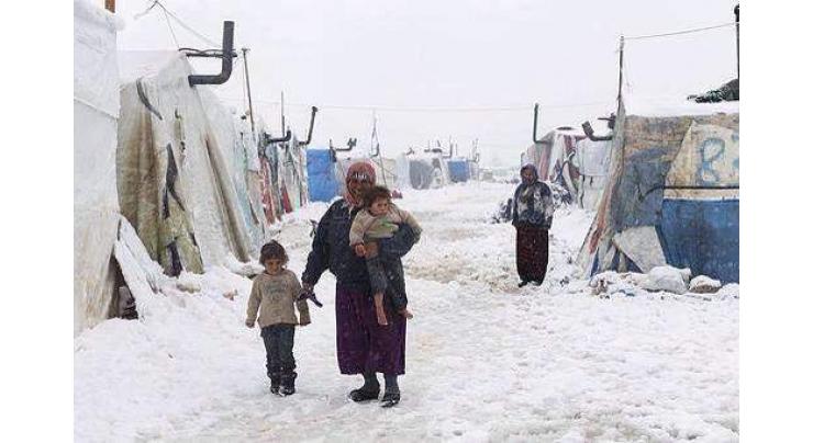 13 Syrians have died of cold fleeing to Lebanon, UN says 