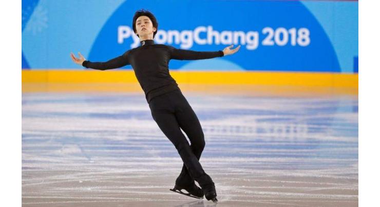 Defending champ Hanyu on top after flawless Olympic showing 