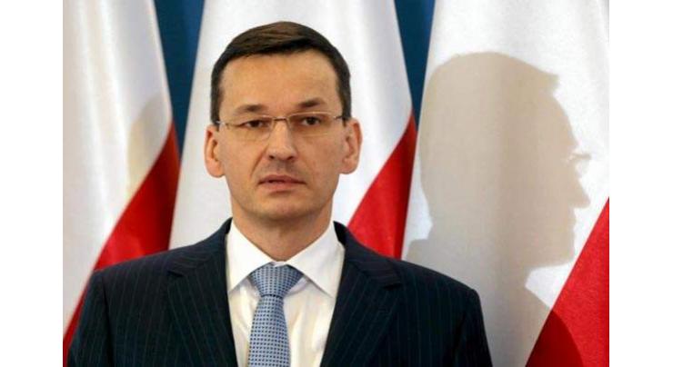 Polish PM seeks to thaw ties with Berlin trip 