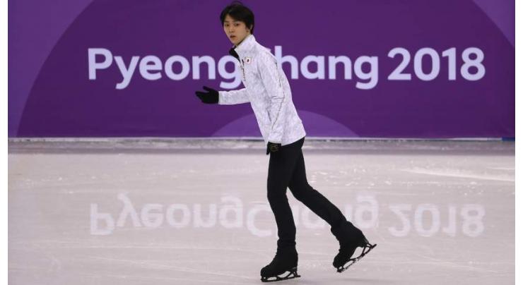 Imperious Yuzuru Hanyu on brink of Olympic title 