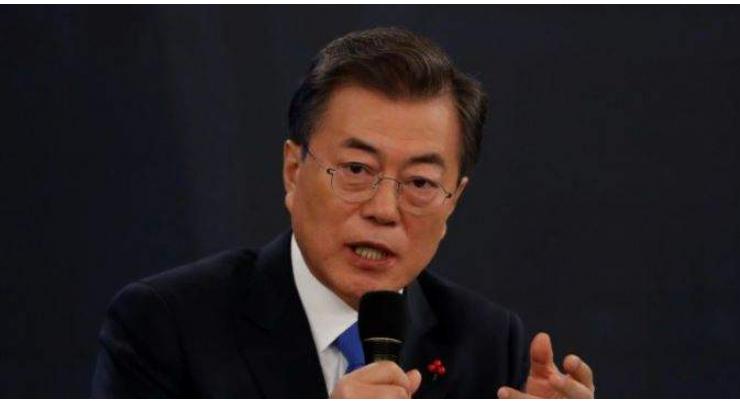 S. Korea's Moon urges 'stern' response to new US tariffs 