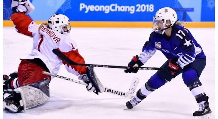 Five-star Canada, USA set up Olympic hockey showdown 