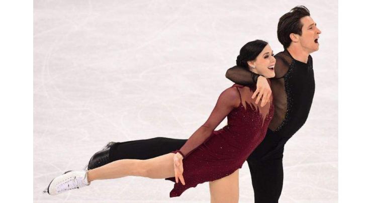 Games face new doping case as Canadian skaters serve up magic 