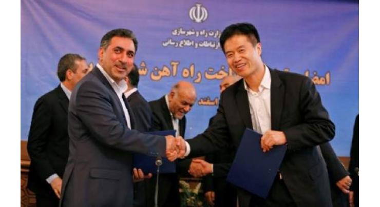 Iran signs deal with China to connect key port to rail network

