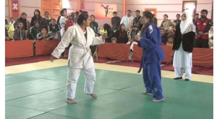 Black belt confers on Hala Sahar in Karate
