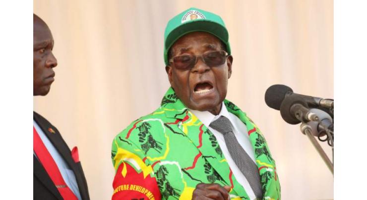 Robert Mugabe risks expulsion from ruling party for dabbling in opposition politics: official
