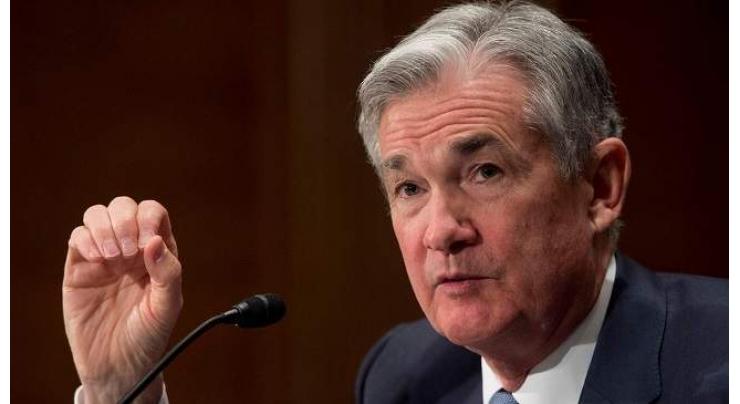 US Fed raises key interest rate amid stronger growth outlook
