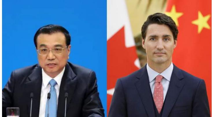 Li Keqiang ,  Justin Trudeau  congratulate on opening of China-Canada Tourism Year
