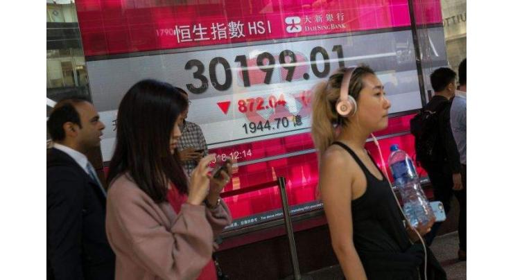 Hong Kong, Shanghai stocks dive on US-China trade war fears
