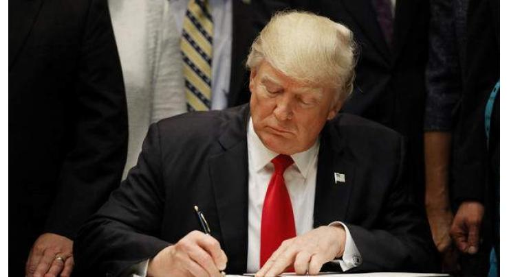 Trump signs budget to avoid US government shutdown
