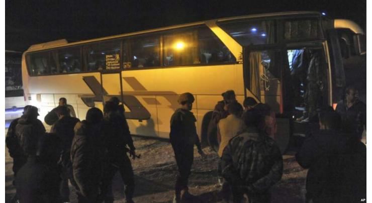 Over 7,000 rebels, families evacuate Syria's Eastern Ghouta

