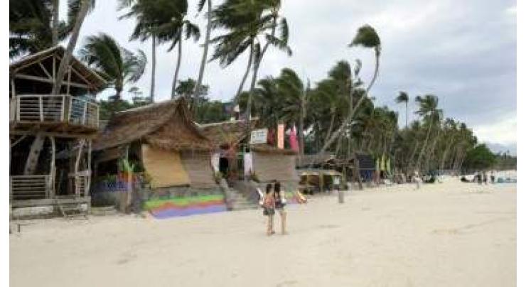 Philippine tourist island scrambles as shutdown looms
