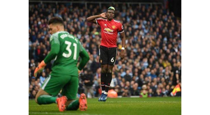 Pogba leads thrilling Man Utd comeback to keep City waiting for title
