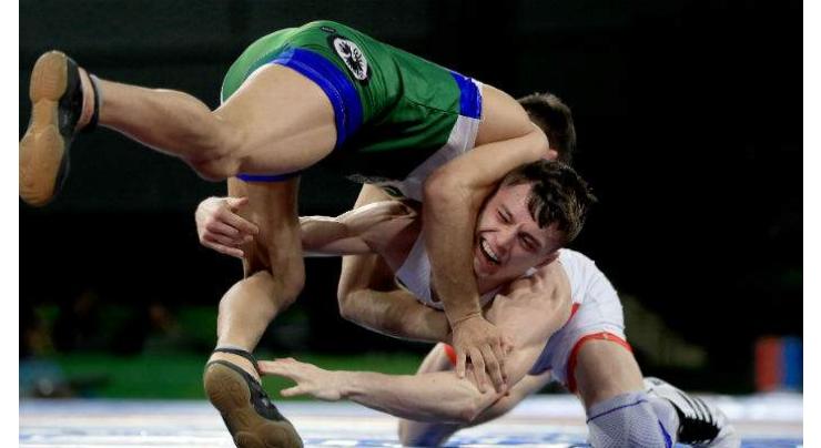Pakistani wrestler M. Bilal wins bronze medal in 57kg free style wrestling
