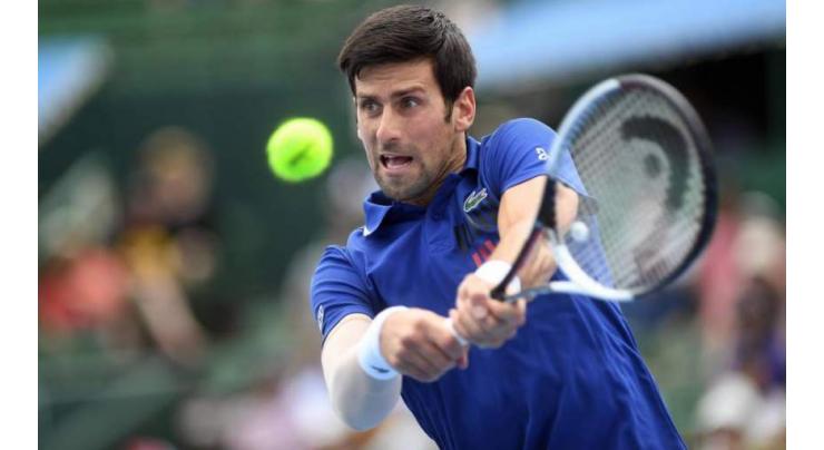 Djokovic battles past Coric to reach third round

