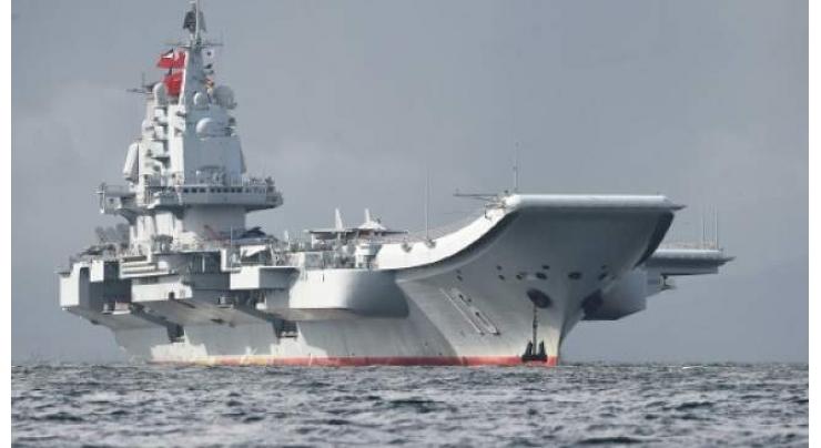 Chinese carrier leads live fire drill in East China Sea
