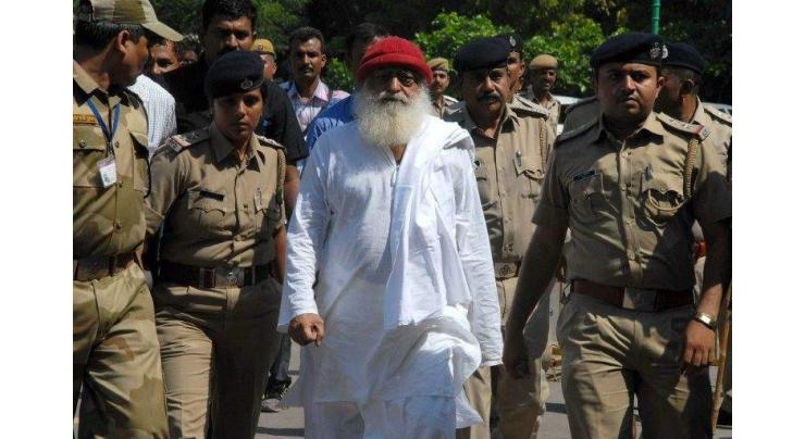 Indian court convicts popular guru of raping teen: lawyer
