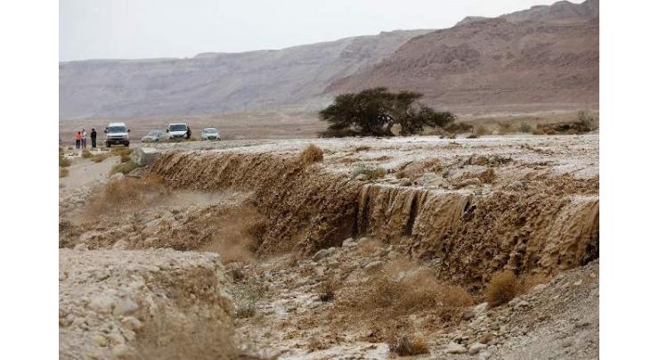 Two dead as floods hit Israel, West Bank
