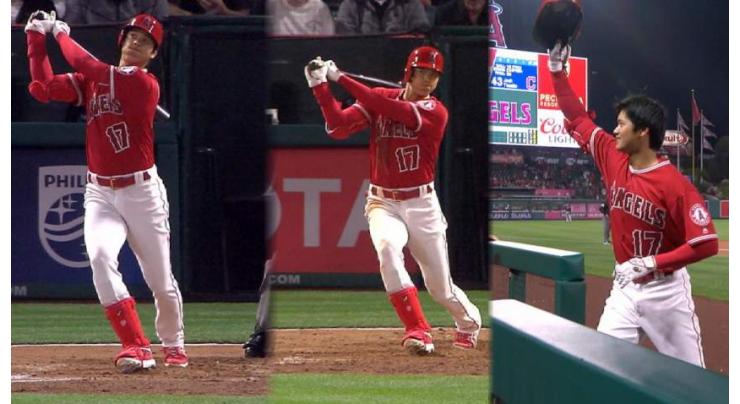 Ohtani hits homer, leaves game with sprained ankle
