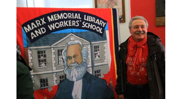Symposium commemorating birth anniversary of Marx's major books held
