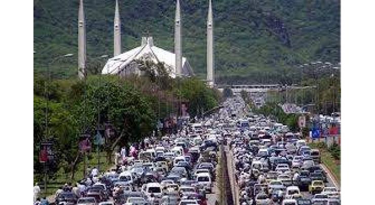 Capital witnesses mammoth crowd of autos,population ,traffic,

