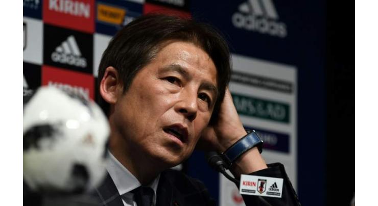 Football: Japan coach Nishino plays safe in shadow World Cup squad
