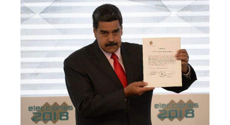 Venezuela's Maduro expels US diplomats, rejects sanctions
