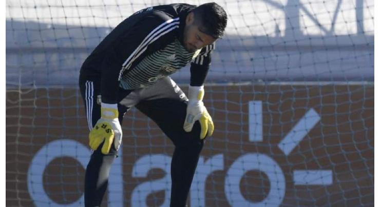 Argentina goalkeeper Romero out of World Cup with knee injury
