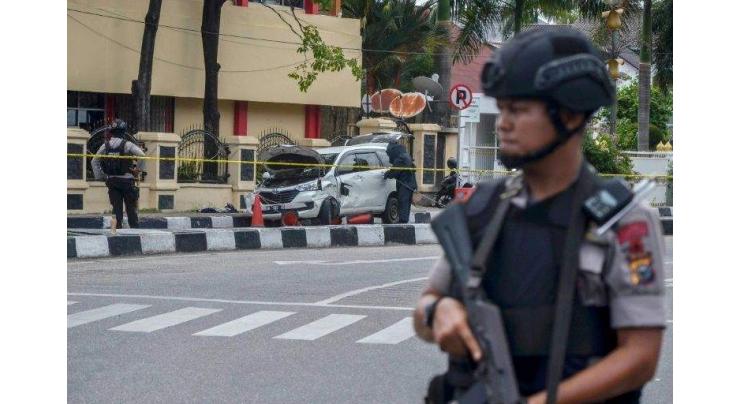 Indonesia passes tougher terror law after suicide attacks
