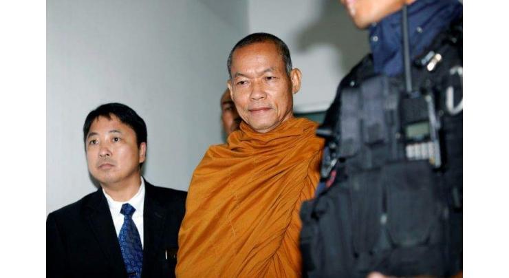 Firebrand Thai monk charged over amulet fraud
