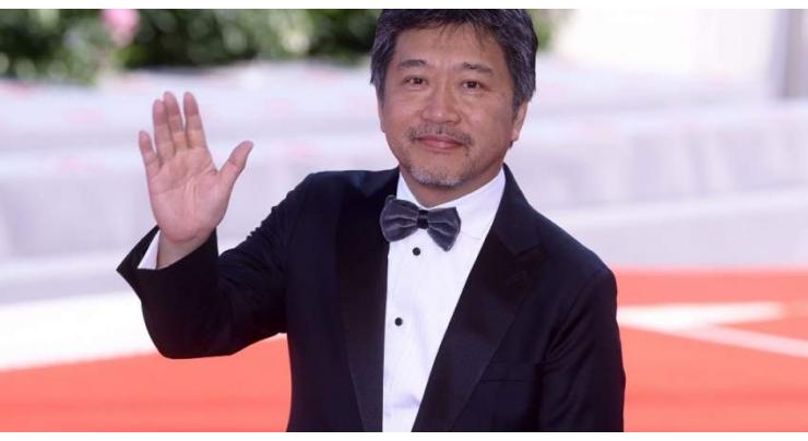 Cannes winner Kore-eda shines light on Japan's hidden poor

