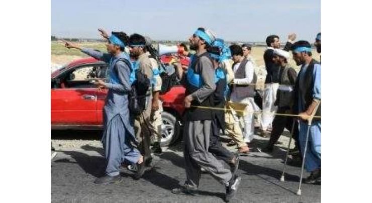 Blistered and hungry: Afghans walk hundreds of kilometres for peace
